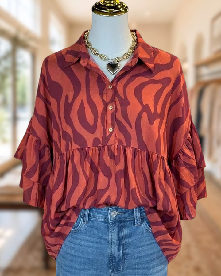 Zebra Print Ruffle Sleeve Collared Half Button Peplum Blouse